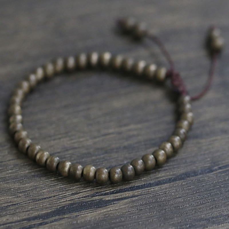 Bracciale semplice in ottone e rame con Buddha Stones, equilibrio e ricchezza
