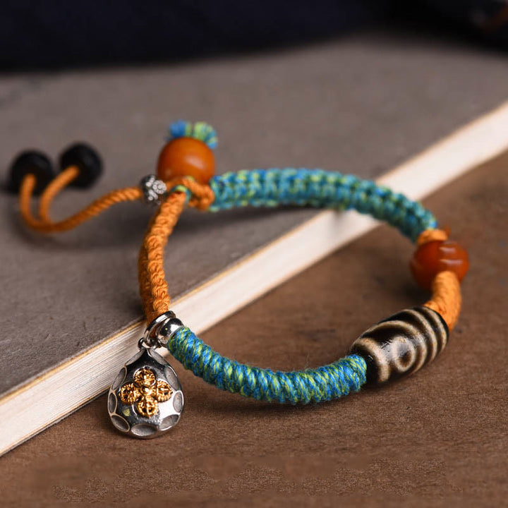 Bracciale intrecciato con perline Dzi tibetane fatte a mano di Buddha Stones