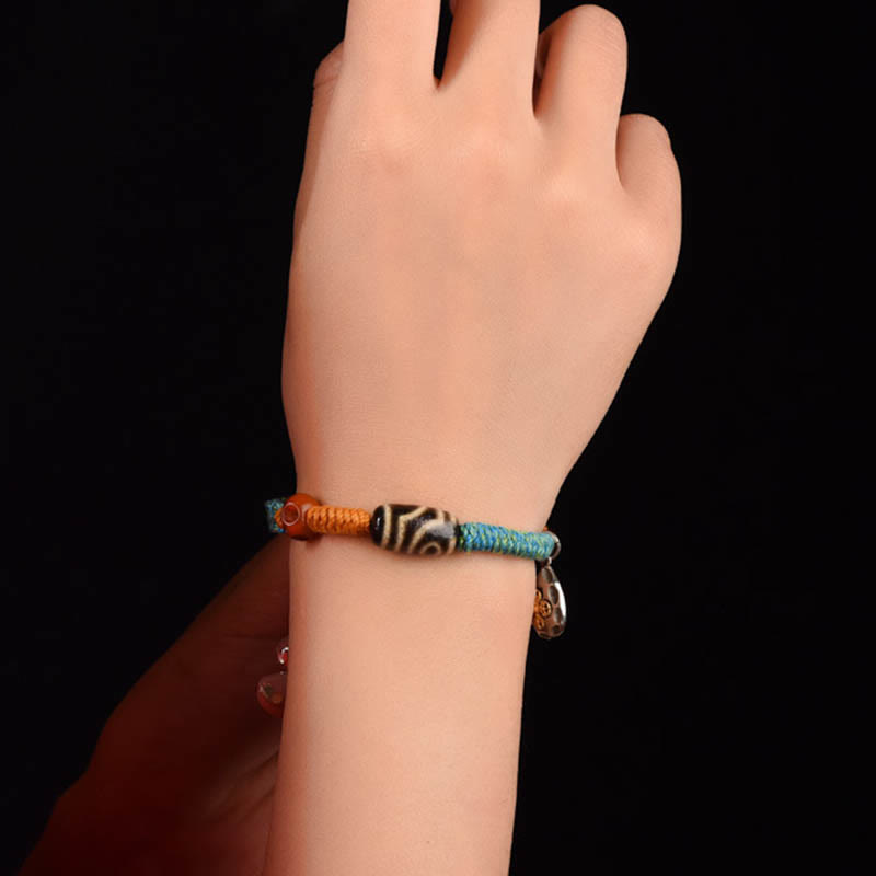 Bracciale intrecciato con perline Dzi tibetane fatte a mano di Buddha Stones