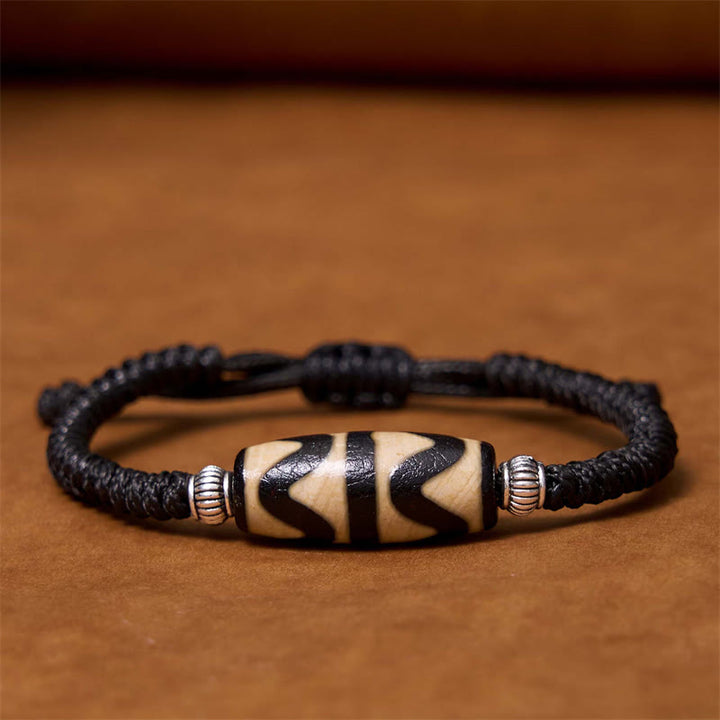 Buddha Stones Tibetano Perlina Dzi a nove occhi Perlina Dzi a tre occhi Braccialetto di corda di protezione della ricchezza
