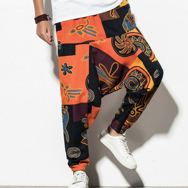 Pantaloni harem da uomo in cotone con stampa graffiti di uccelli rossi e marroni Buddha Stones con tasche