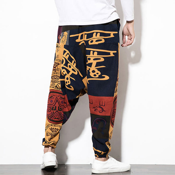 Pantaloni harem da uomo in cotone con stampa graffiti di uccelli rossi e marroni Buddha Stones con tasche
