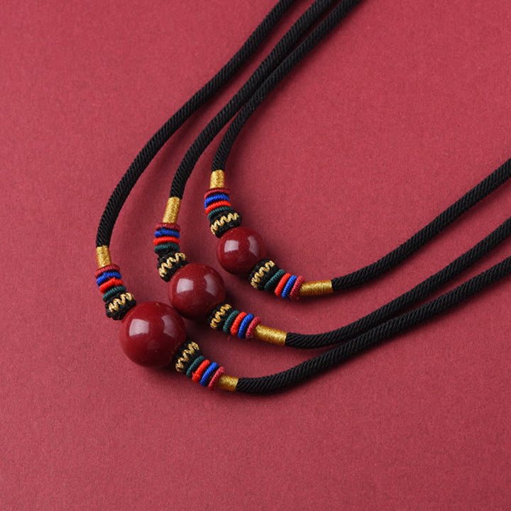 Collana con ciondolo con perline portafortuna in cinabro Buddha Stones, per tenere lontani gli spiriti maligni