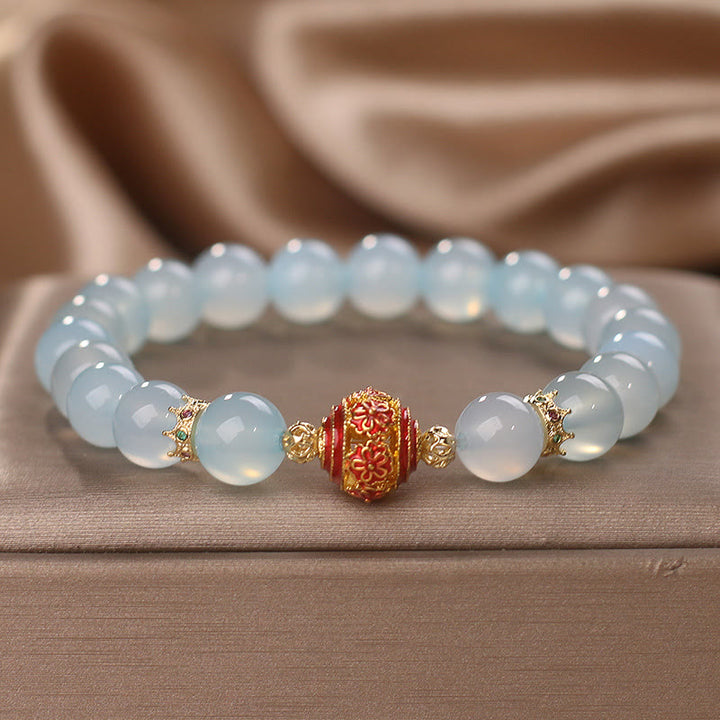 Braccialetto di guarigione con perline di fiori di acquamarina naturale Buddha Stones