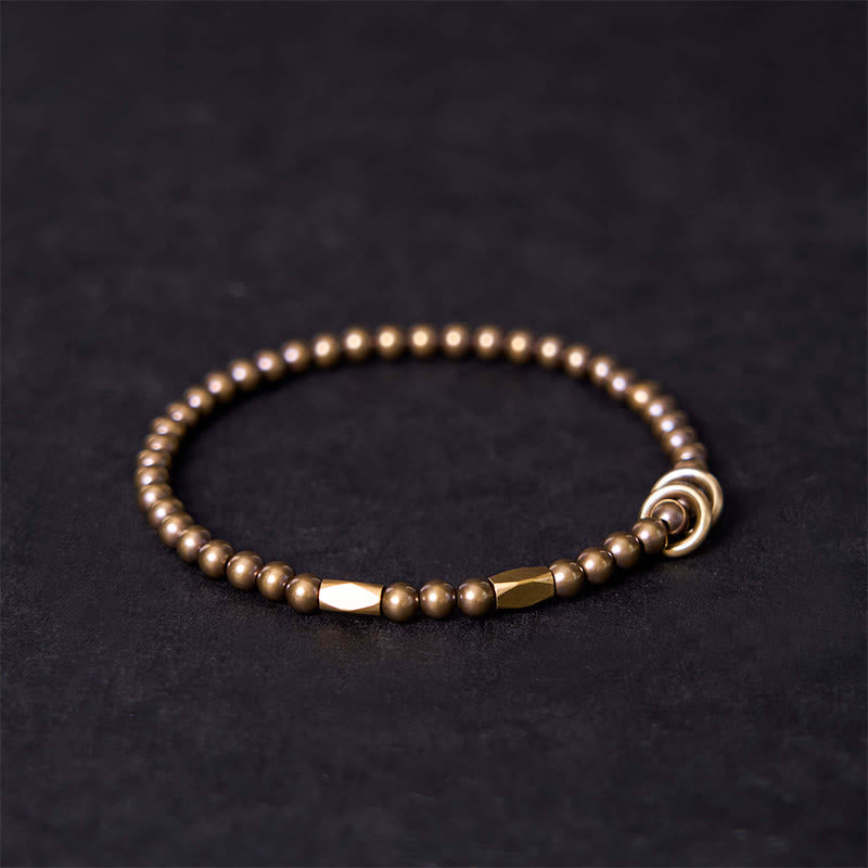 Braccialetto di coppia con perline in ottone e rame, design Buddha Stones Wealth Self Care - image 1