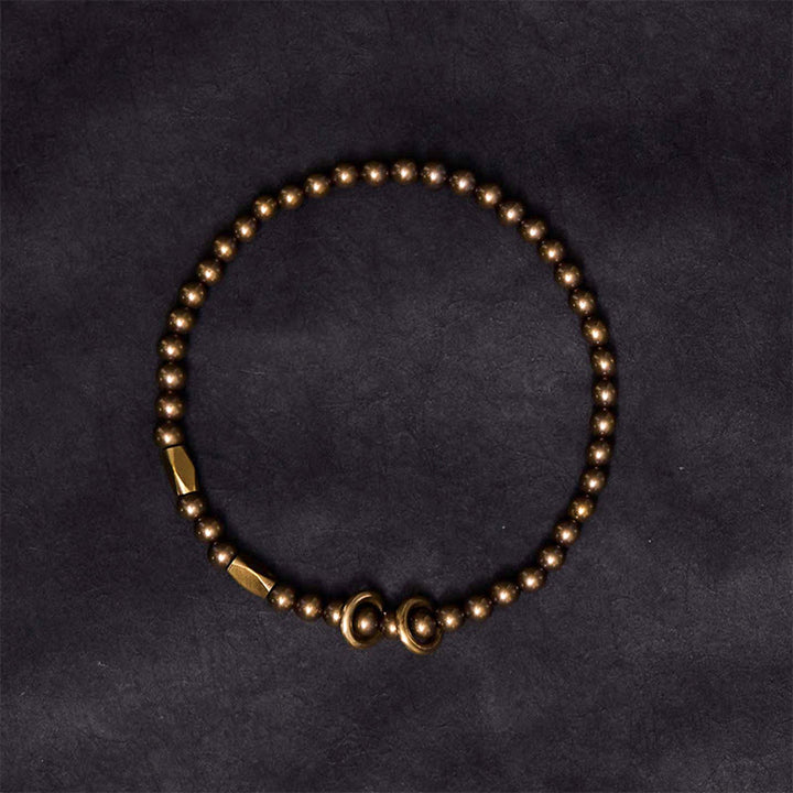 Braccialetto di coppia con perline in ottone e rame, design Buddha Stones Wealth Self Care - image 3