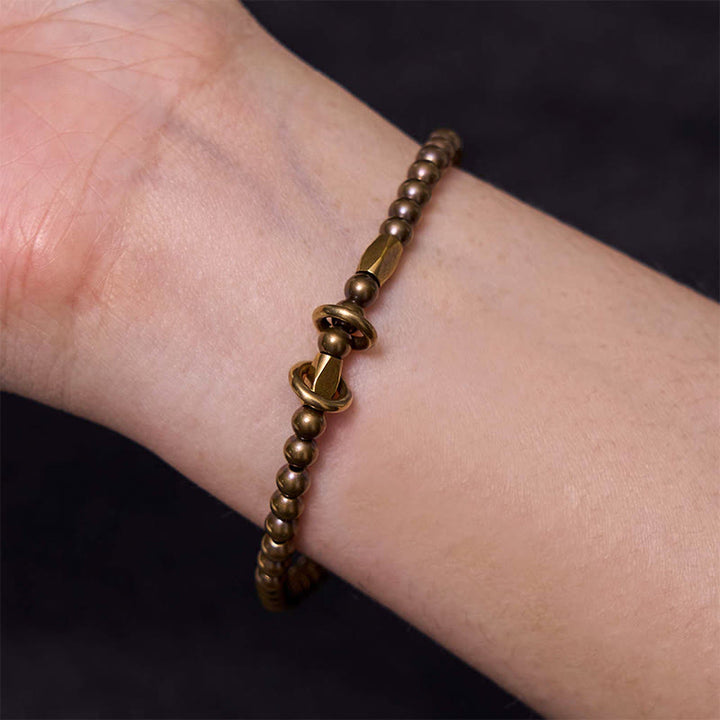 Braccialetto di coppia con perline in ottone e rame, design Buddha Stones Wealth Self Care - image 6
