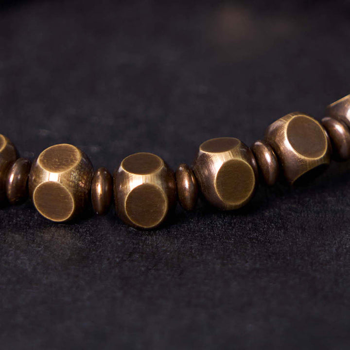 Buddha Stones Tibetano Om Mani Padme Hum Amuleto in ottone intagliato in rame Focus Bracciale