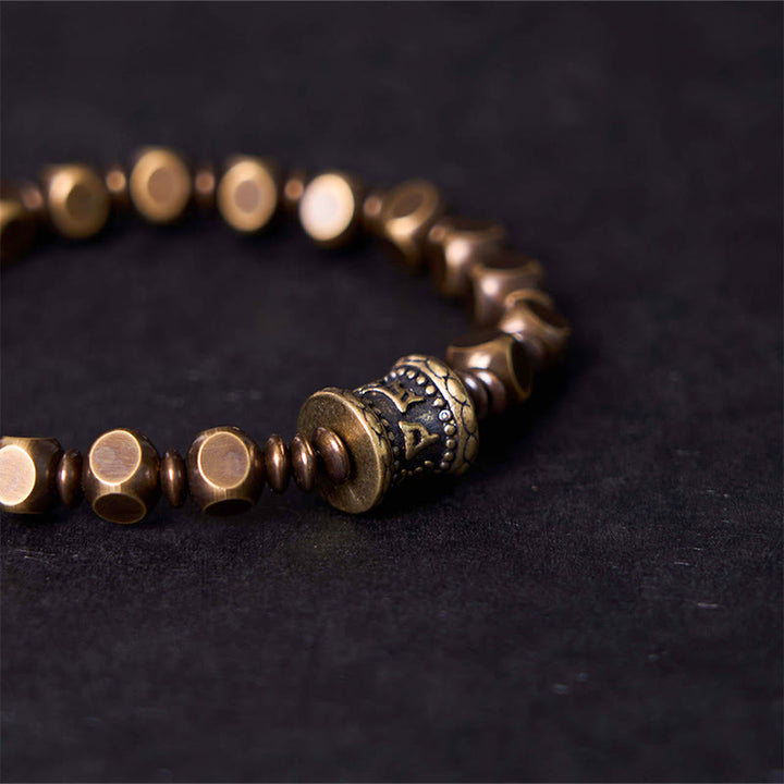 Buddha Stones Tibetano Om Mani Padme Hum Amuleto in ottone intagliato in rame Focus Bracciale