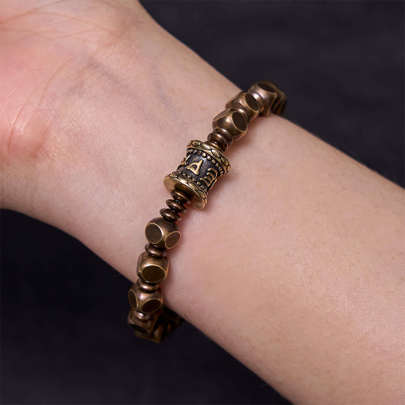 Buddha Stones Tibetano Om Mani Padme Hum Amuleto in ottone intagliato in rame Focus Bracciale