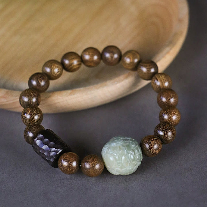Braccialetto di guarigione con perline di legno di ebano, semi di sandalo Bodhi , Buddha Stones