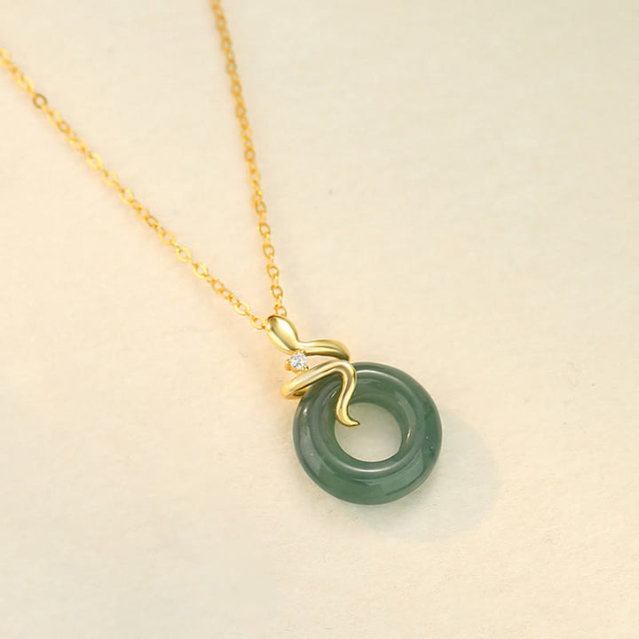 Collana con ciondolo a forma di serpente Buddha Stones in argento sterling 925, oro 18 carati, giada e fibbia della pace