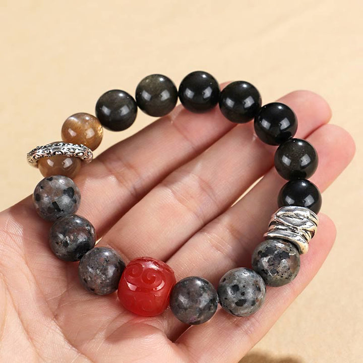 Braccialetto di protezione in agata rossa, ossidiana, pietra lavica e pietre dorate Buddha Stones