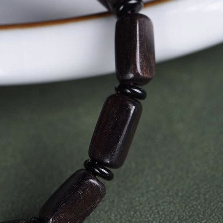 Braccialetto di equilibrio con perline rettangolari in legno di ebano e Buddha Stones Dzi