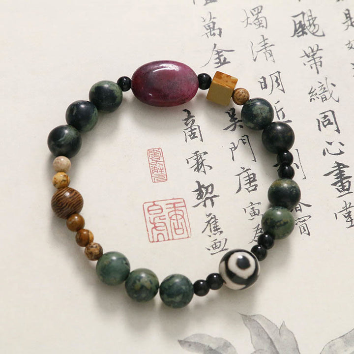 Braccialetto di successo di potere di perline Dzi a tre occhi in agata verde Buddha Stones