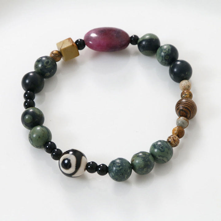 Braccialetto di successo di potere di perline Dzi a tre occhi in agata verde Buddha Stones