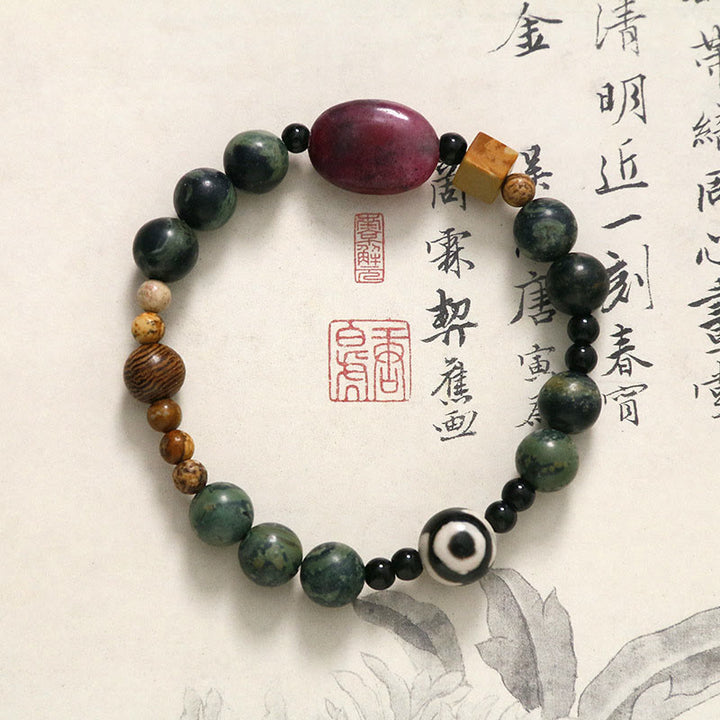 Braccialetto di successo di potere di perline Dzi a tre occhi in agata verde Buddha Stones