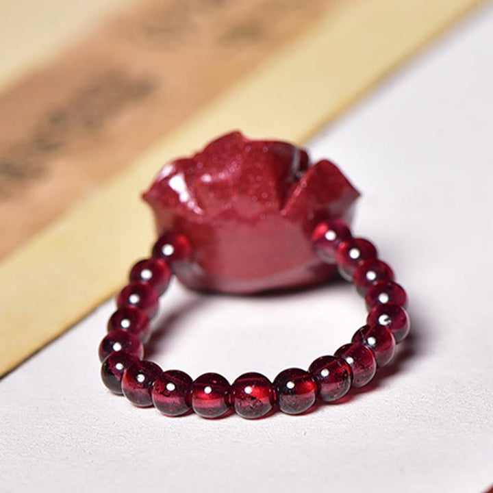 Anello di concentrazione con perle di granato rosa e cinabro Buddha Stones