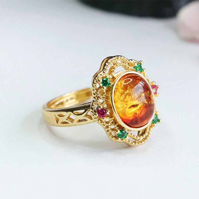 Anello di fiducia in Buddha Stones con fiore di ambra cava in pizzo