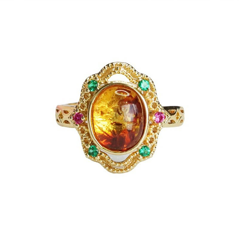 Anello di fiducia in Buddha Stones con fiore di ambra cava in pizzo