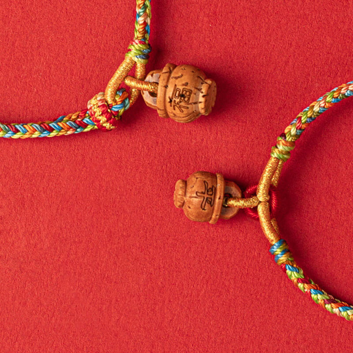 Braccialetto Buddha Stones Peach Wood Fu Character Safe And Well Wealth