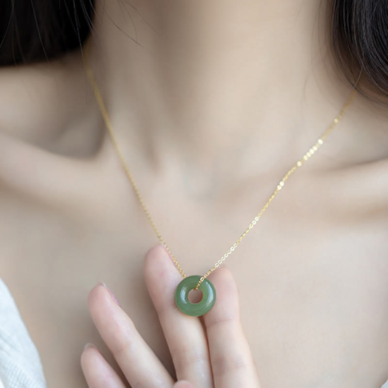 Collana con ciondolo con fibbia della pace in giada Hetian placcata in oro e argento sterling 925 Buddha Stones
