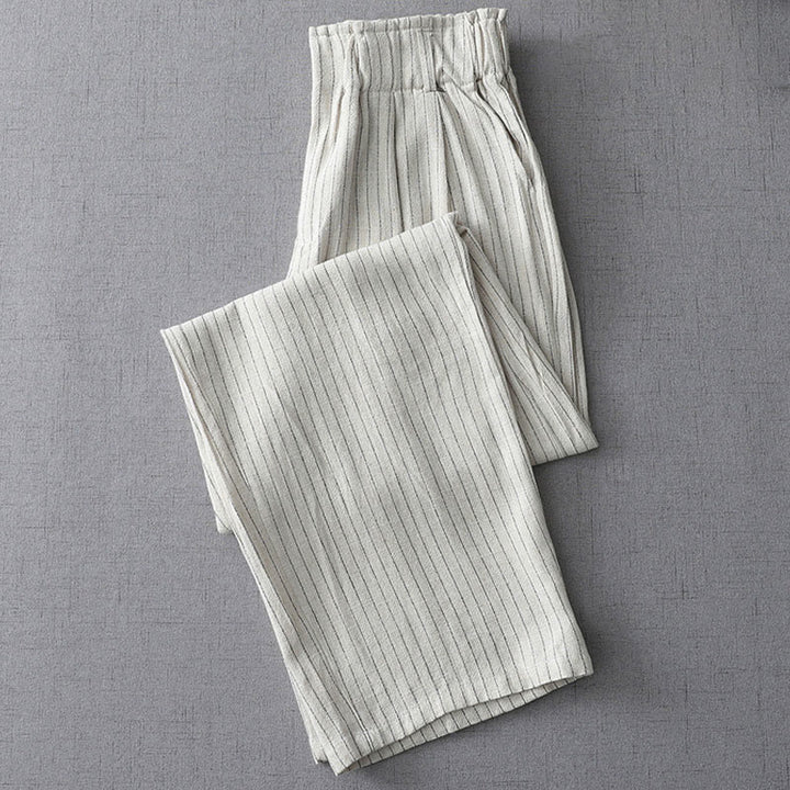 Pantaloni a gamba larga a vita alta con righe verticali Buddha Stones e tasche - image 1