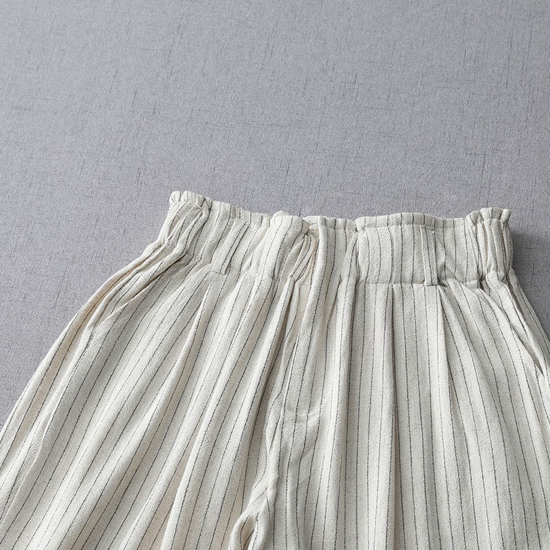 Pantaloni a gamba larga a vita alta in cotone e lino a righe verticali Buddha Stones con tasche
