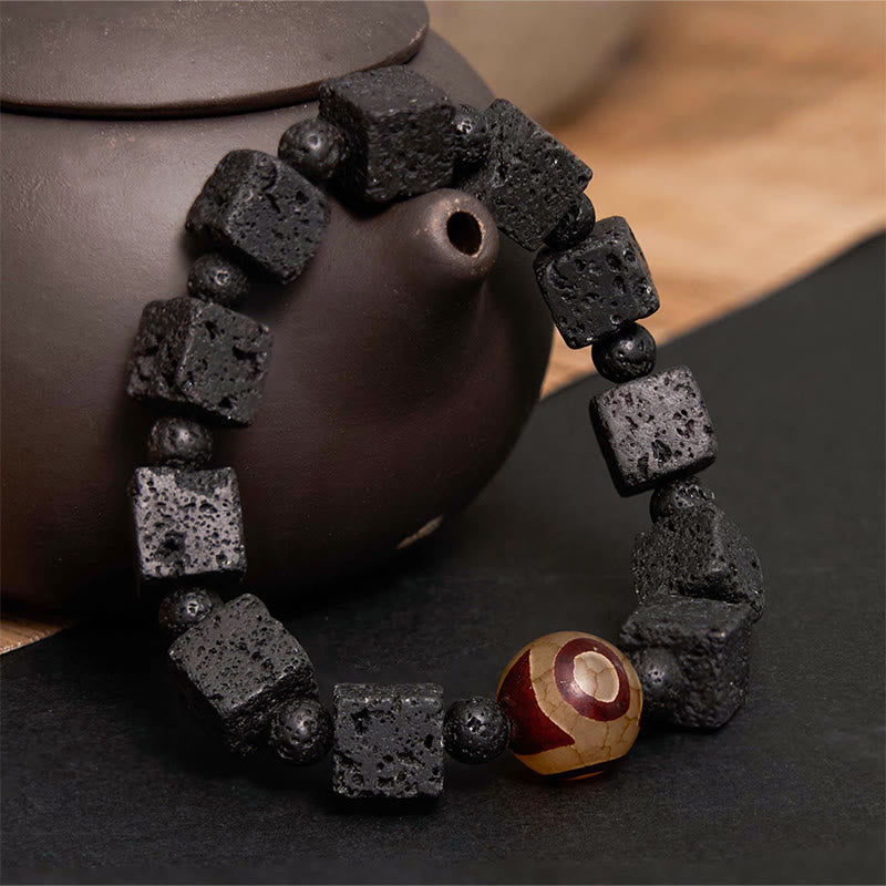 Braccialetto di guarigione con perline di Dzi e pietra lavica Buddha Stones