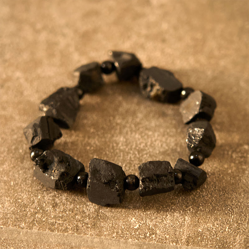 Braccialetto positivo con pietra irregolare in tormalina nera Buddha Stones