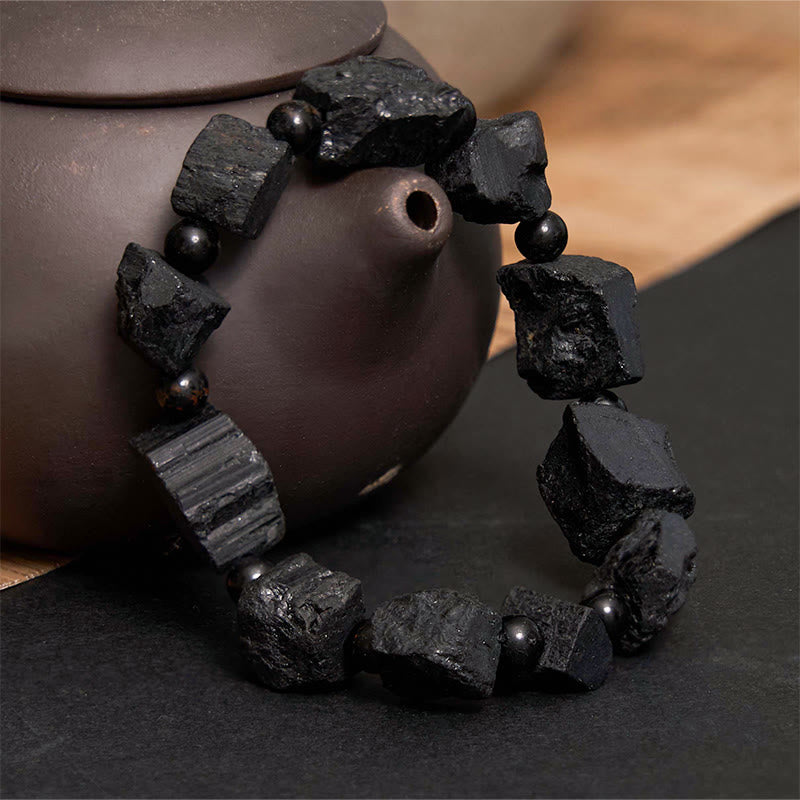 Braccialetto positivo con pietra irregolare in tormalina nera Buddha Stones
