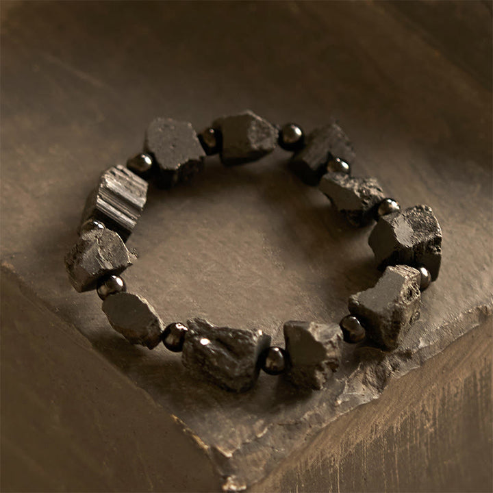 Braccialetto positivo con pietra irregolare in tormalina nera Buddha Stones