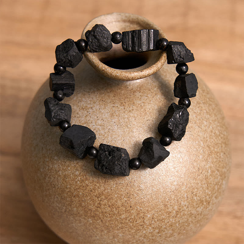 Braccialetto positivo con pietra irregolare in tormalina nera Buddha Stones