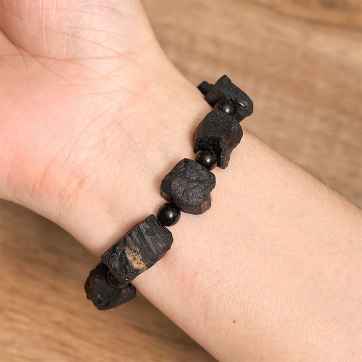 Braccialetto positivo con pietra irregolare in tormalina nera Buddha Stones