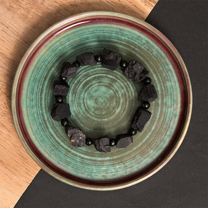 Braccialetto positivo con pietra irregolare in tormalina nera Buddha Stones