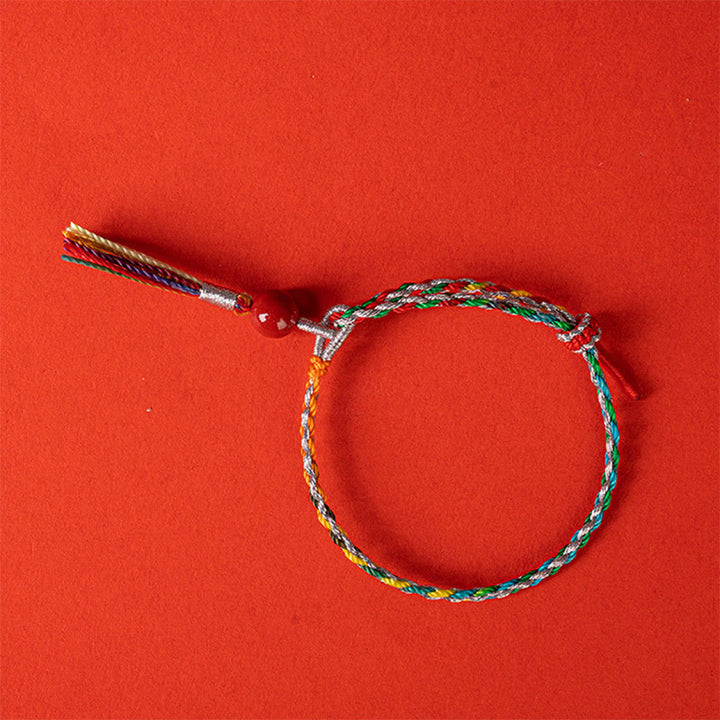 Braccialetto di concentrazione in cinabro con corda colorata Buddha Stones