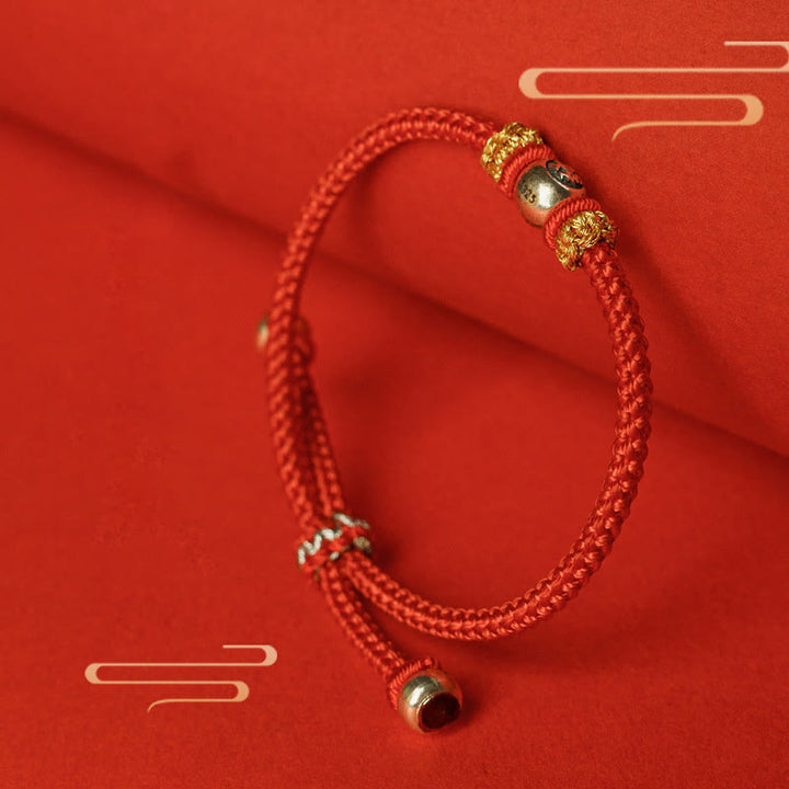 Braccialetto di protezione con caratteri cinesi in corda rossa Buddha Stones
