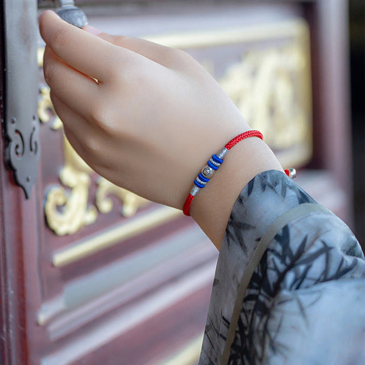 Braccialetto di protezione con caratteri cinesi in corda rossa Buddha Stones