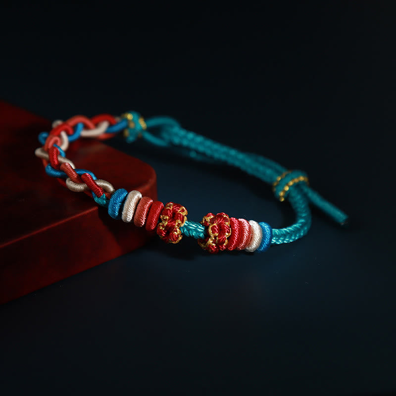 Braccialetto di collegamento Buddha Stones String Four Srand Peach Blossom