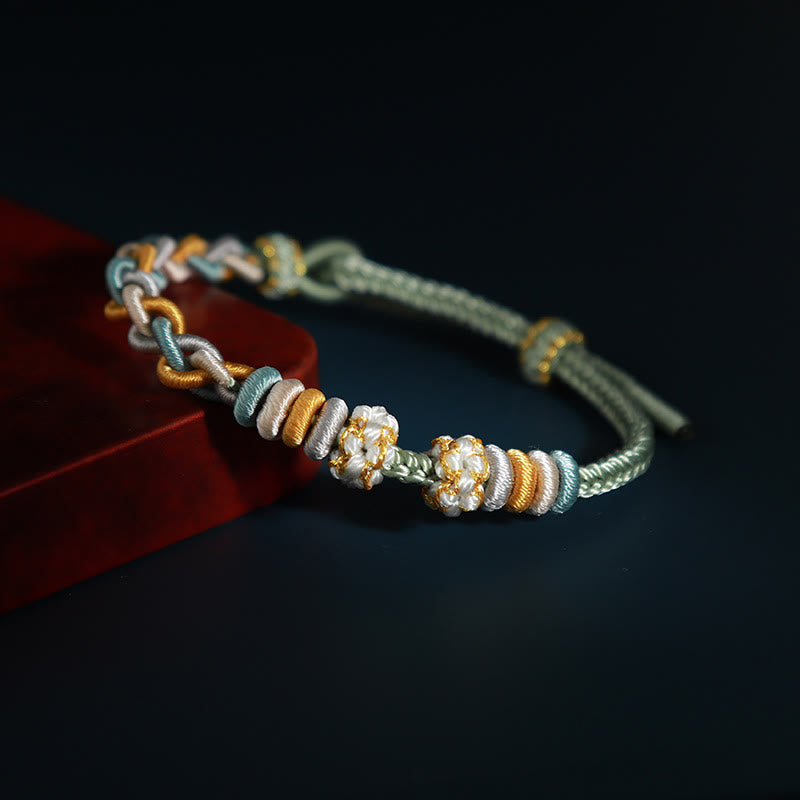 Braccialetto di collegamento Buddha Stones String Four Srand Peach Blossom