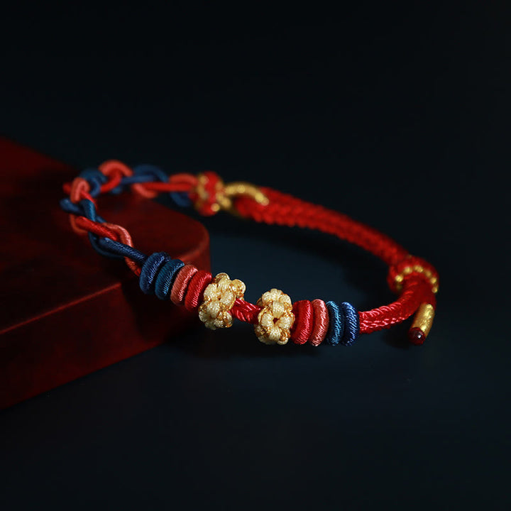 Braccialetto di collegamento Buddha Stones String Four Srand Peach Blossom