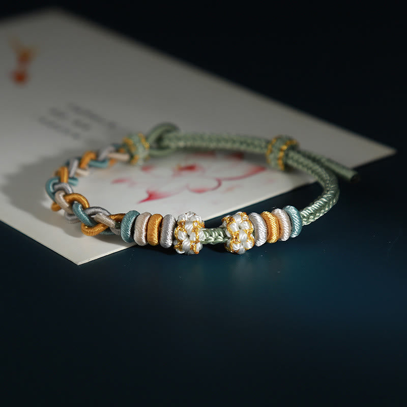 Braccialetto di collegamento Buddha Stones String Four Srand Peach Blossom