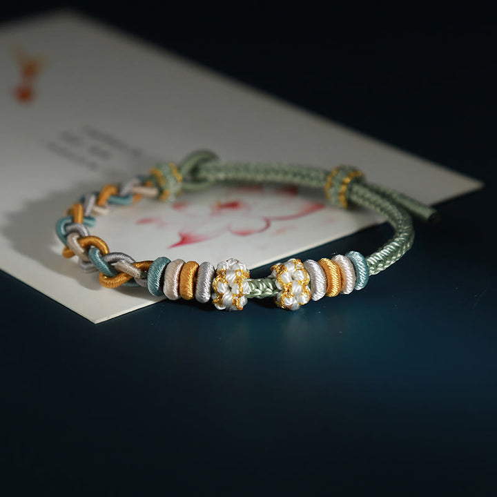 Braccialetto di collegamento Buddha Stones String Four Srand Peach Blossom