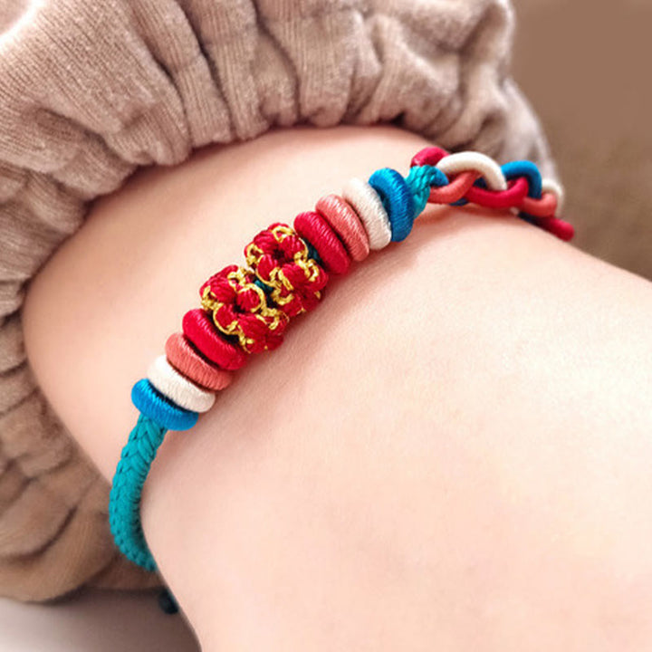 Braccialetto di collegamento Buddha Stones String Four Srand Peach Blossom