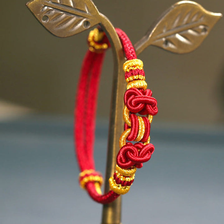 Braccialetto Buddha Stones Red String Saddle Knot Strength