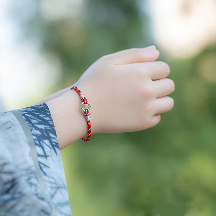 Bracciale portafortuna in argento sterling 925 con cordino rosso Buddha Stones