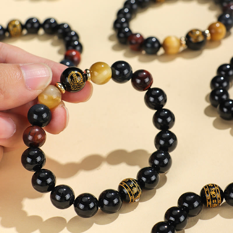 Buddha Stones Onice nero Occhio di tigre Om Mani Padme Hum Zodiaco cinese Braccialetto di supporto del Buddha di Natale