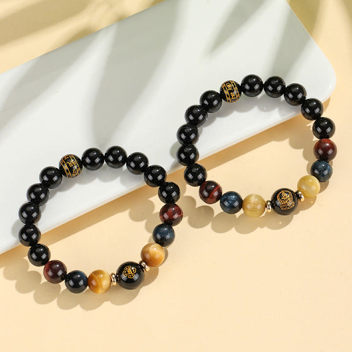 Buddha Stones Onice nero Occhio di tigre Om Mani Padme Hum Zodiaco cinese Braccialetto di supporto del Buddha di Natale