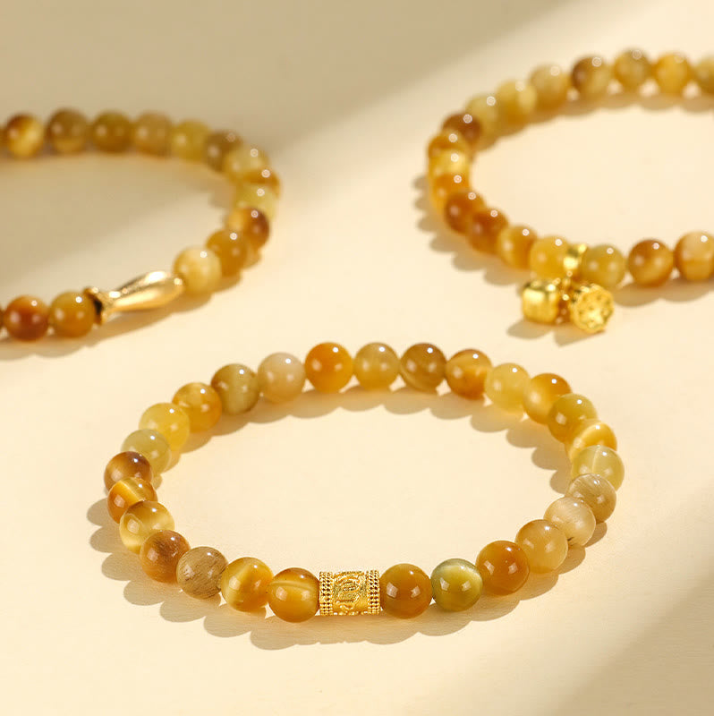 Bracciale di protezione con Buddha Stones Occhio di tigre Fu Carattere Bambù Koi Pesce Loto Om Mani Padme Hum