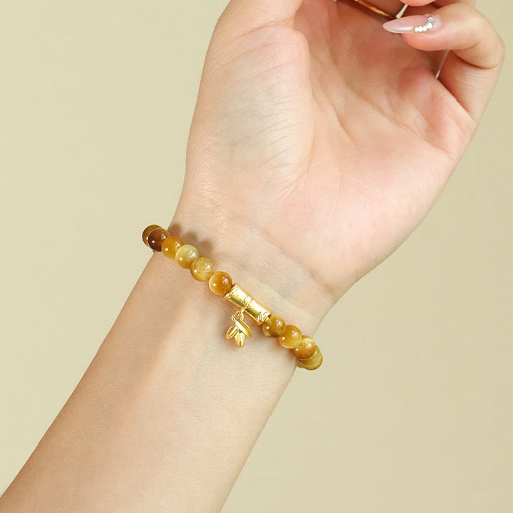 Bracciale di protezione con Buddha Stones Occhio di tigre Fu Carattere Bambù Koi Pesce Loto Om Mani Padme Hum